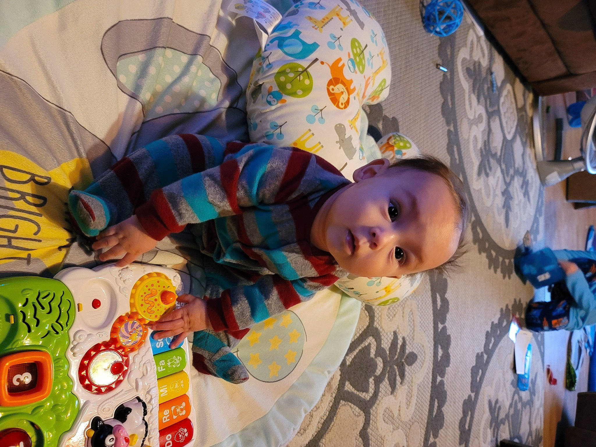 Santino is registered to the contest to win money with this photo: art, baby, baby_products, baby_toys, cheek, child, fun, happy, hat, leisure, pattern, people, person, play, product, room, surprise, textile, toddler, toy