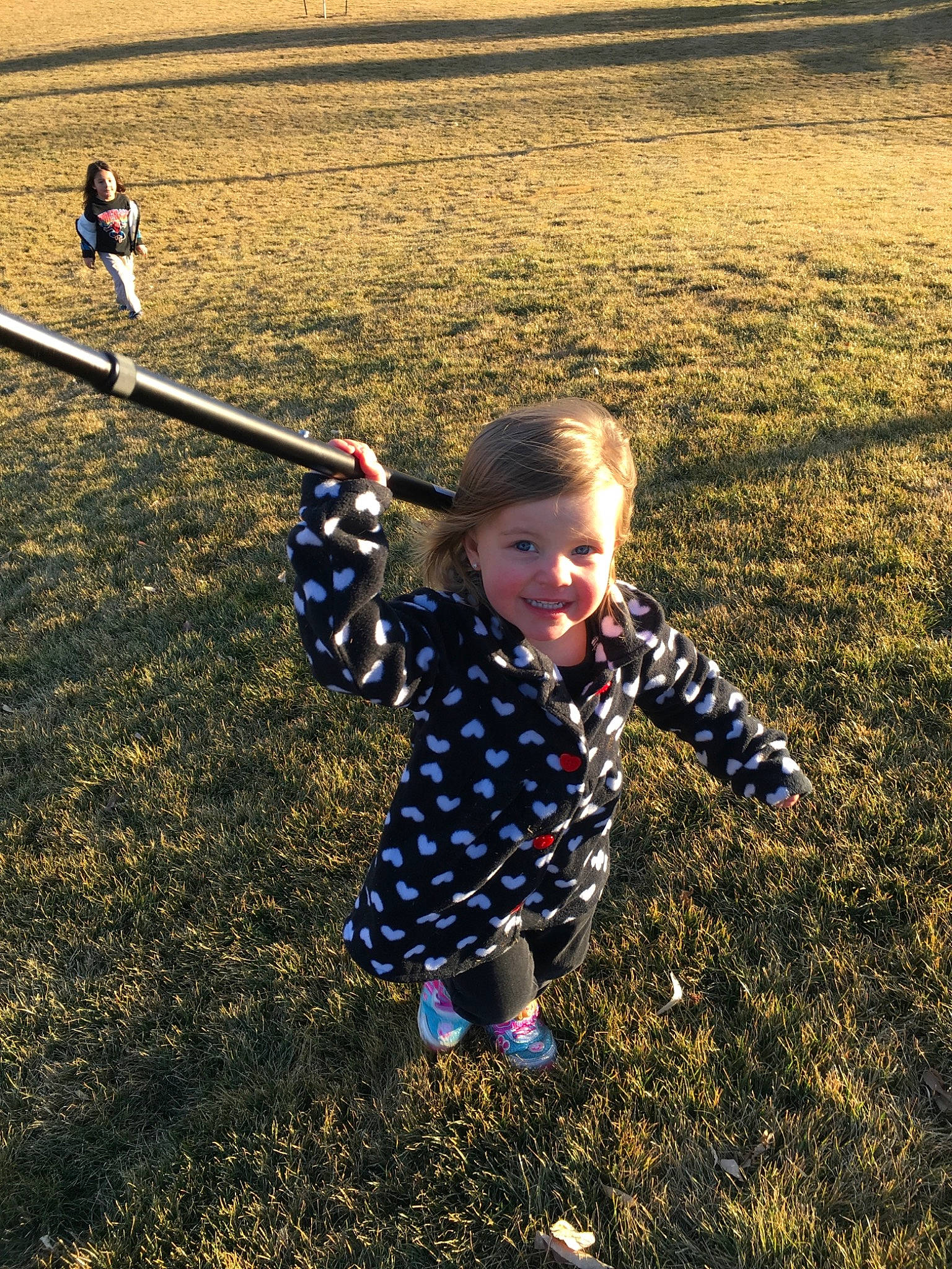 Luna is registered to the contest to win money with this photo: child, fun, grass, happy, leaf, person, plant, play, playground, sky, smile, toddler, tree