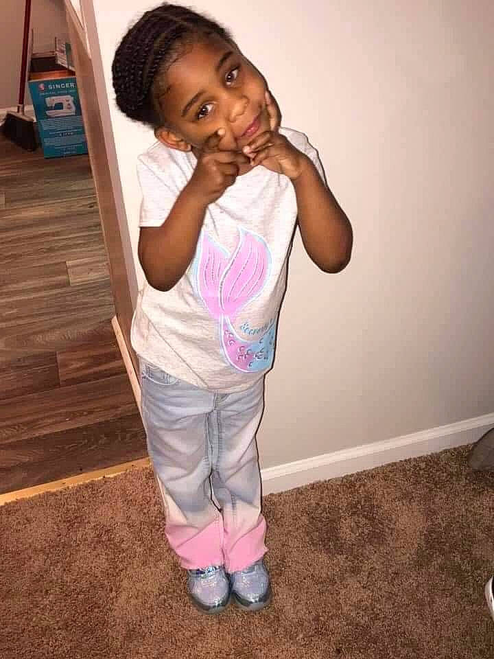 Liberty is registered to the contest to win money with this photo: active_pants, baby_toddler_clothing, elbow, eye, face, flooring, gesture, hair, happy, head, knee, neck, person, shoulder, sleeve, standing, sweatpant, t_shirt, thigh, toddler