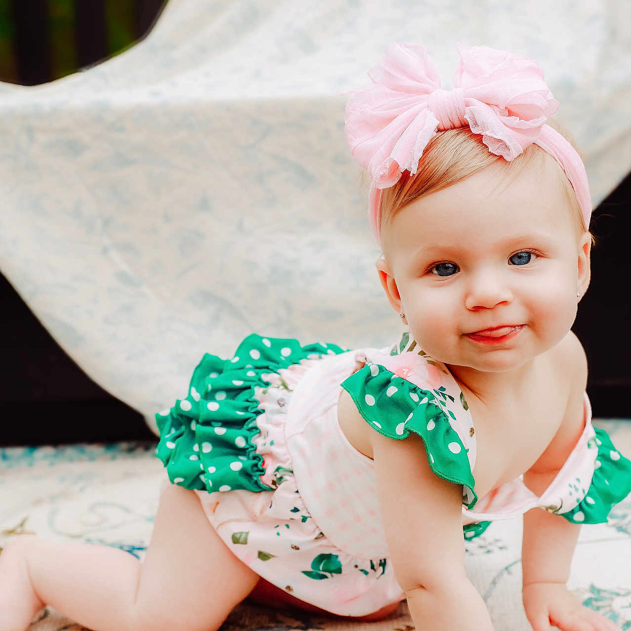 Embry joined the competition — help win amazing prizes! baby, babycrawling, blonde, bodypart, clothing, crawling, diaper, dress, face, finger, hair, hand, happy, head, newborn, person, photography, portrait, sitting, smile