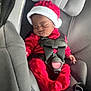 baby, infant, car_seat, red_clothing, santa_hat, sleeping, child, seatbelt, holiday, cute, fuzzy, indoors, person, car_interior, christmas, festive, young_child, baby_clothes, seat, safety