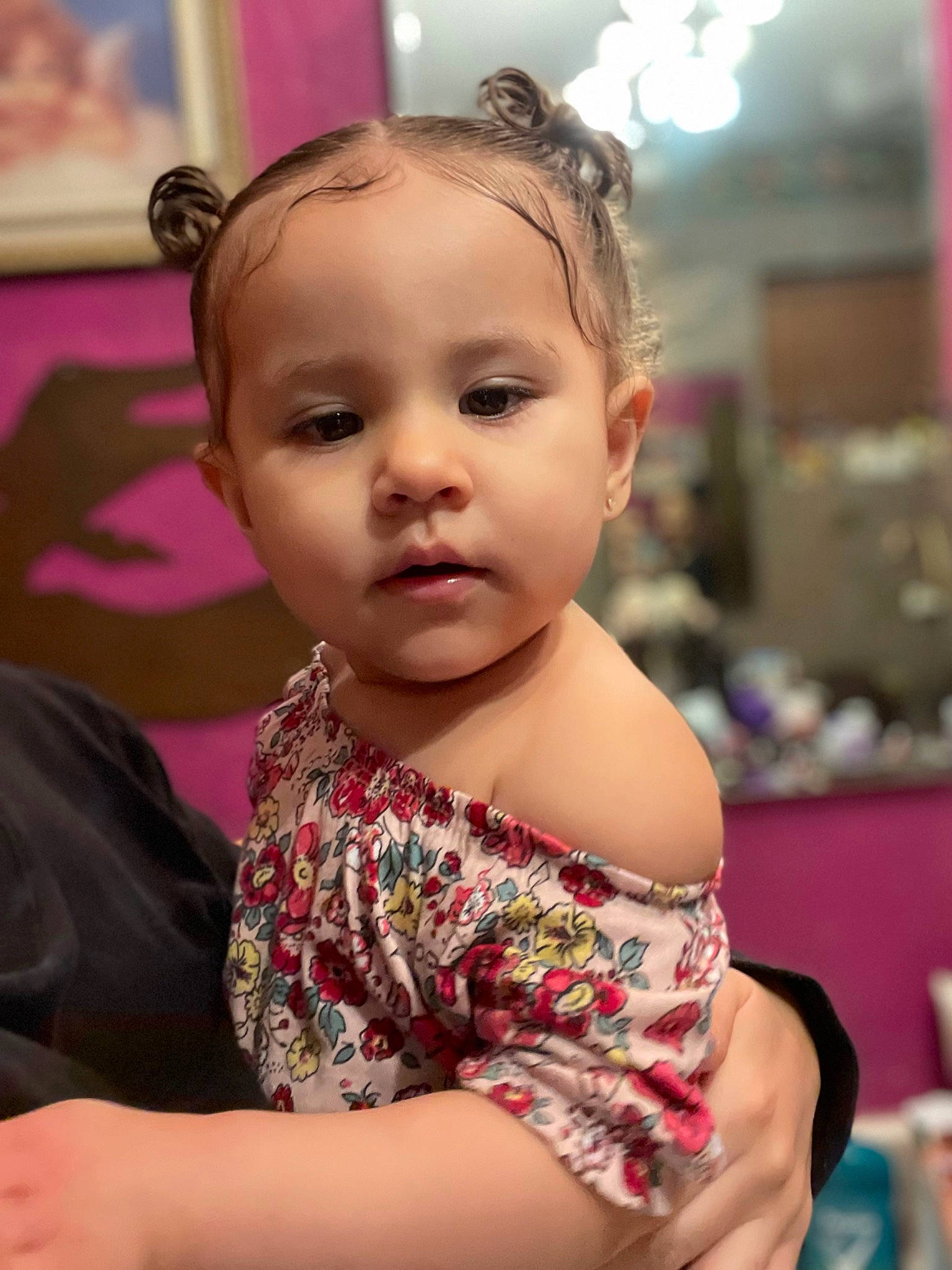 Reina is registered to the contest to win money with this photo: arm, baby_toddler_clothing, cheek, child, chin, dress, event, eye, eyelash, face, facial_expression, fun, hand, happy, head, iris, leisure, person, pink, skin