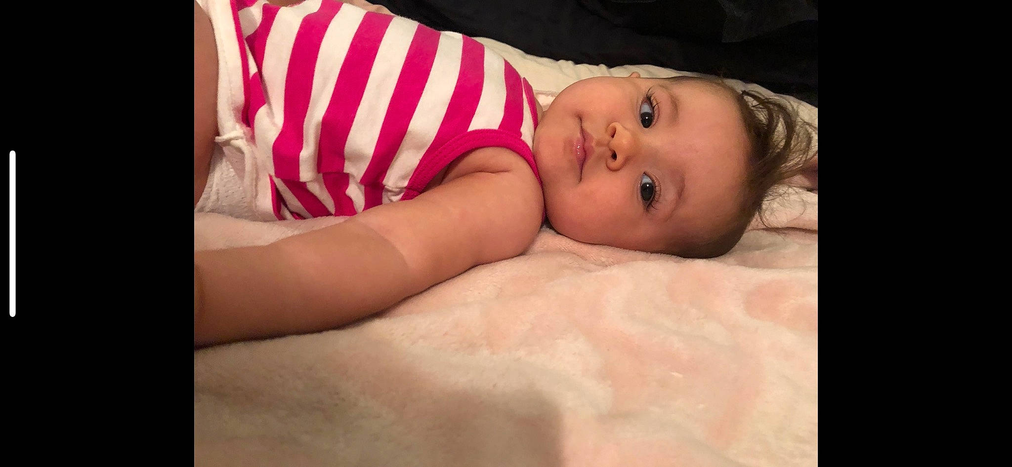 Reina joined the competition — help win amazing prizes! baby, baby_toddler_clothing, bedding, bedtime, cheek, child, comfort, face, flash_photography, fur, happy, linens, lip, pattern, portrait_photography, room, sitting, sleeve, toddler