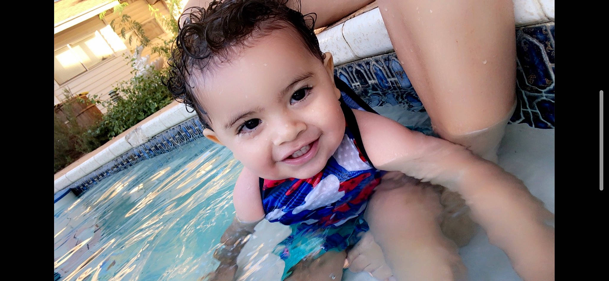 Prince is registered to the contest to win money with this photo: azure, baby, baby_toddler_clothing, black_hair, chest, child, electric_blue, facial_expression, flash_photography, fun, happy, iris, joy, leisure, lip, person, plant, skin, smile, swimming_pool