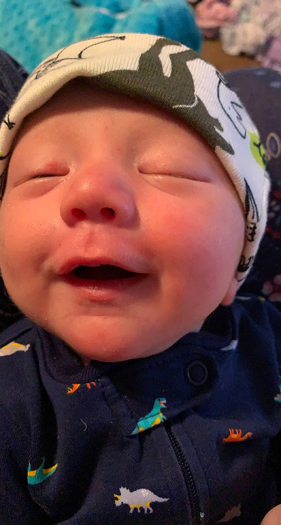 Carter is registered to the contest to win money with this photo: baby, baby_laughing, cap, cheek, chin, cool, eyebrow, eyelash, face, forehead, happy, hat, headgear, lip, nose, person, personal_protective_equipment, pink, skin, smile