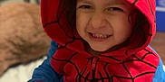 Melek is registered to the contest to win money with this photo: child, kid, spiderman, onesie, costume, hood, red, blue, smile, playful, indoor, portrait, face, hand, candid, cute, baby, expression, fun, person
