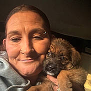 Chiquita joined the competition — help win amazing prizes! affection, brown, close_up, cozy, cute, dog, face, friendship, fur, holding, hoodie, indoor, jewelry, pet, piercing, portrait, puppy, ring, smile, woman