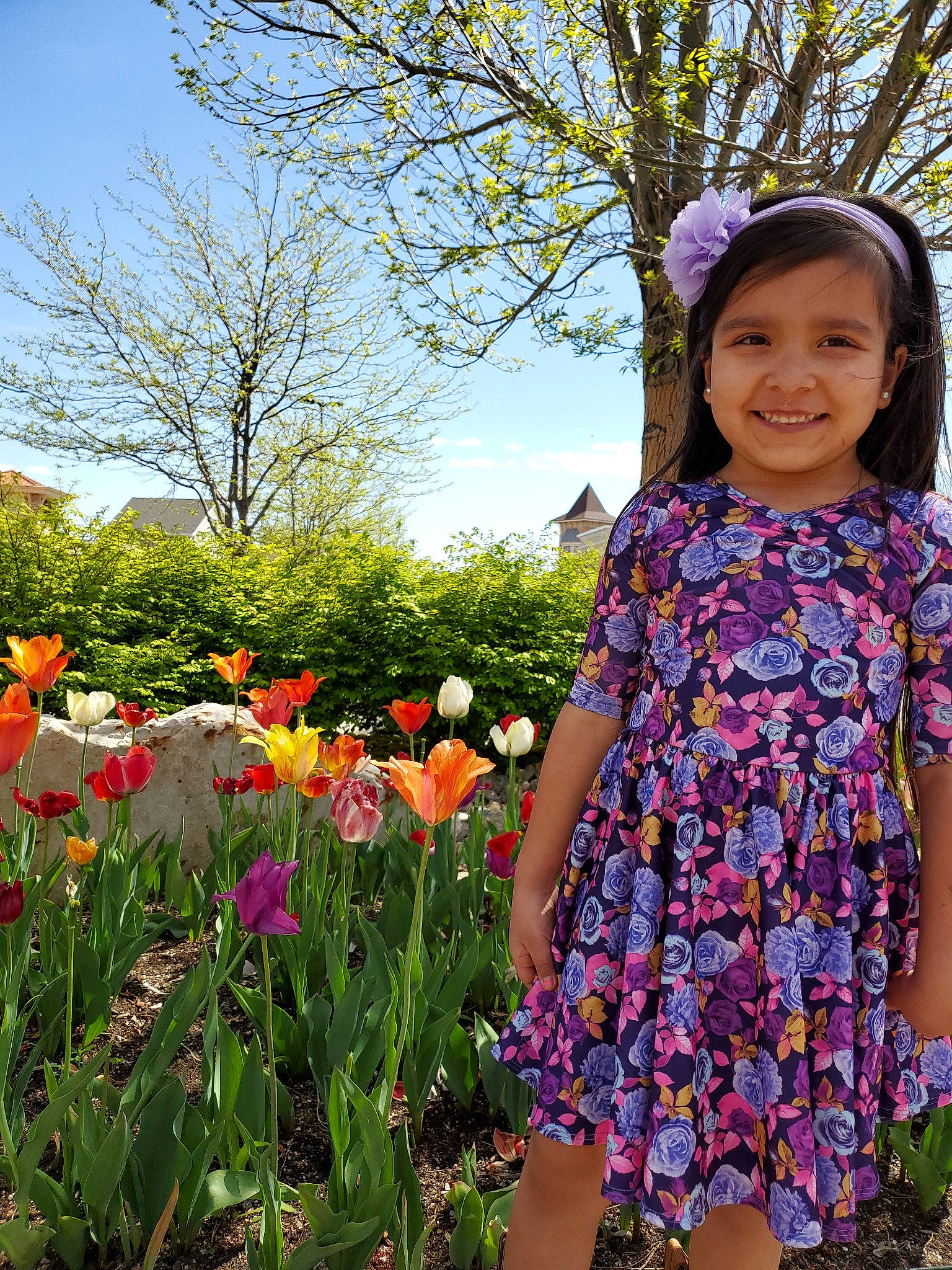 Makynlie joined the competition — help win amazing prizes! botanical_garden, botany, child, dress, flower, flowering_plant, garden, grass, happy, headgear, iris, joy, lily_family, person, petal, plant, purple, spring, toddler, tulip