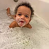 toddler, child, bath, bathtub, bubbles, foam, water, curly_hair, face, skin, blue_eyes, soap, playing, happy, wet, indoor, cleaning, fun, cute, baby