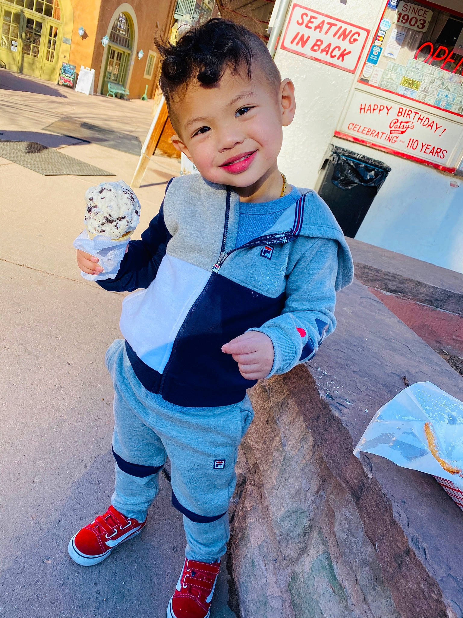 Maddox is registered to the contest to win money with this photo: child, child_model, denim, jacket, jeans, joy, outerwear, person, sleeve, smile, toddler