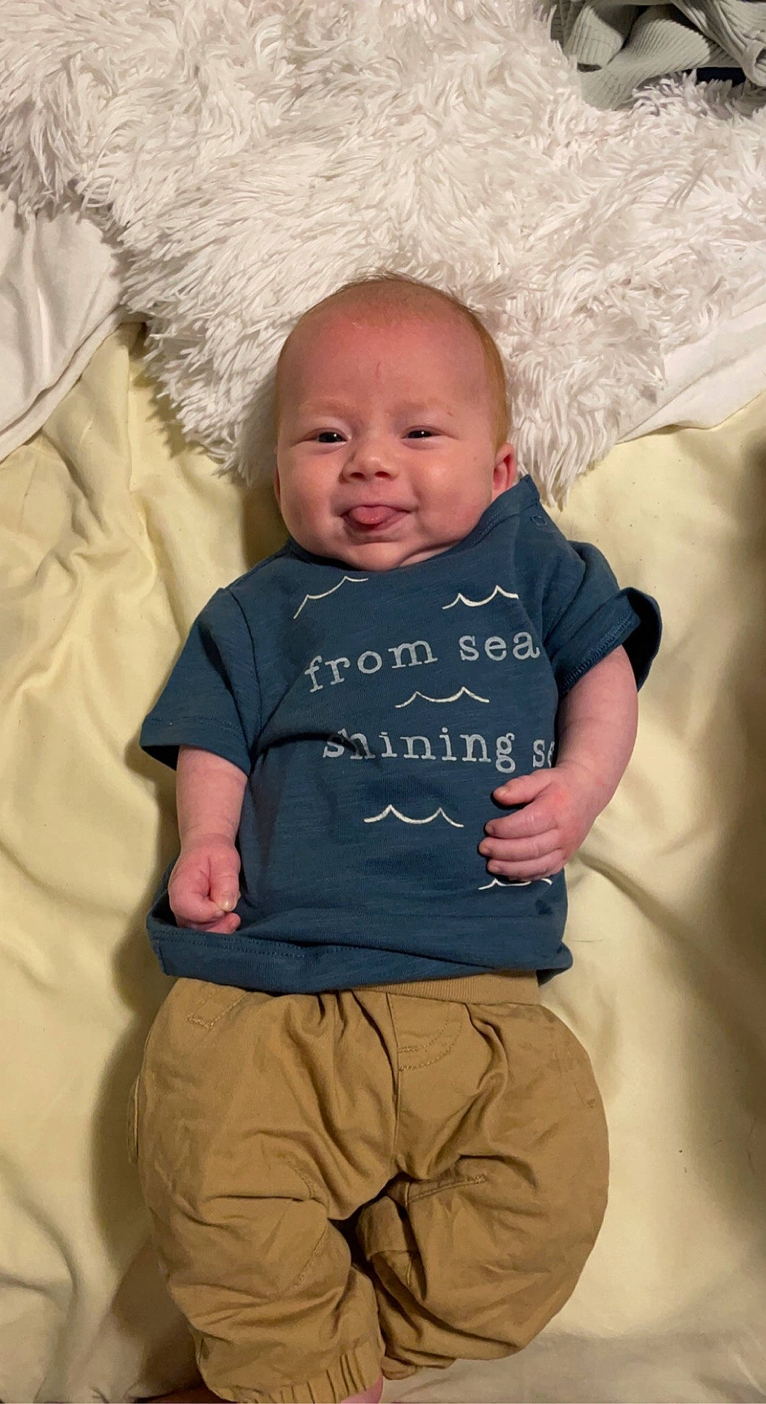 Kasyn joined the competition — help win amazing prizes! baby_toddler_clothing, cheek, comfort, eye, face, grey, happy, head, human, mammal, mouth, nose, organ, person, product, skin, sleeve, smile, standing, textile