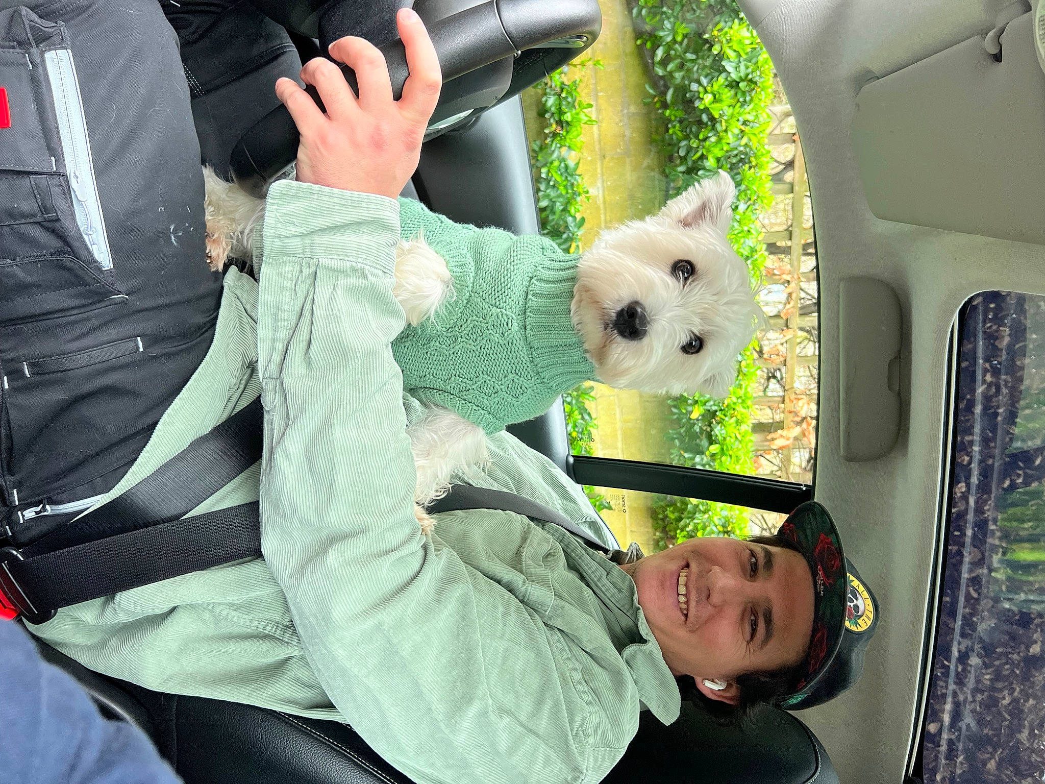 Willa is registered to the contest to win money with this photo: auto_part, automotive_design, automotive_exterior, bag, car, car_seat, comfort, companion_dog, family_car, fun, grass, green, leisure, motor_vehicle, plant, sunglasses, toy, travel, tree, vehicle_door