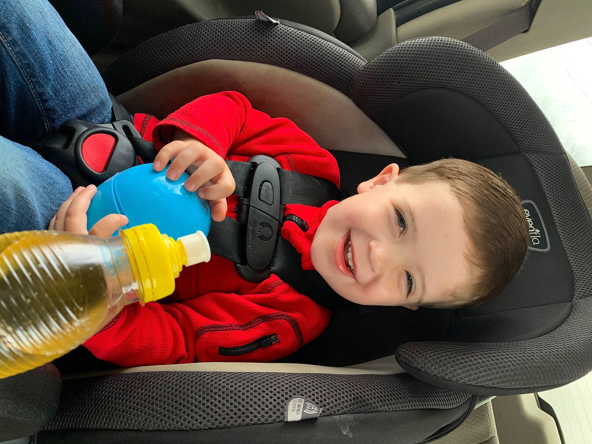 Daxton joined the competition — help win amazing prizes! automotive_design, automotive_wheel_system, baby, baby_carriage, baby_in_car_seat, car_seat, car_seat_cover, child, comfort, drinkware, finger, fun, human_body, joy, person, plastic_bottle, product, smile, steering_wheel, toddler