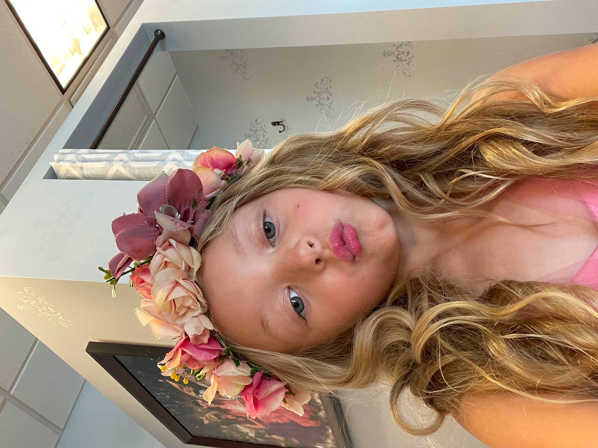 Kinsley is registered to the contest to win money with this photo: blond, brown_hair, cheek, child, comfort, eyelash, flooring, flower, fun, hair_coloring, happy, headwear, iris, lip, person, pink, portrait_photography, room, skin, throat