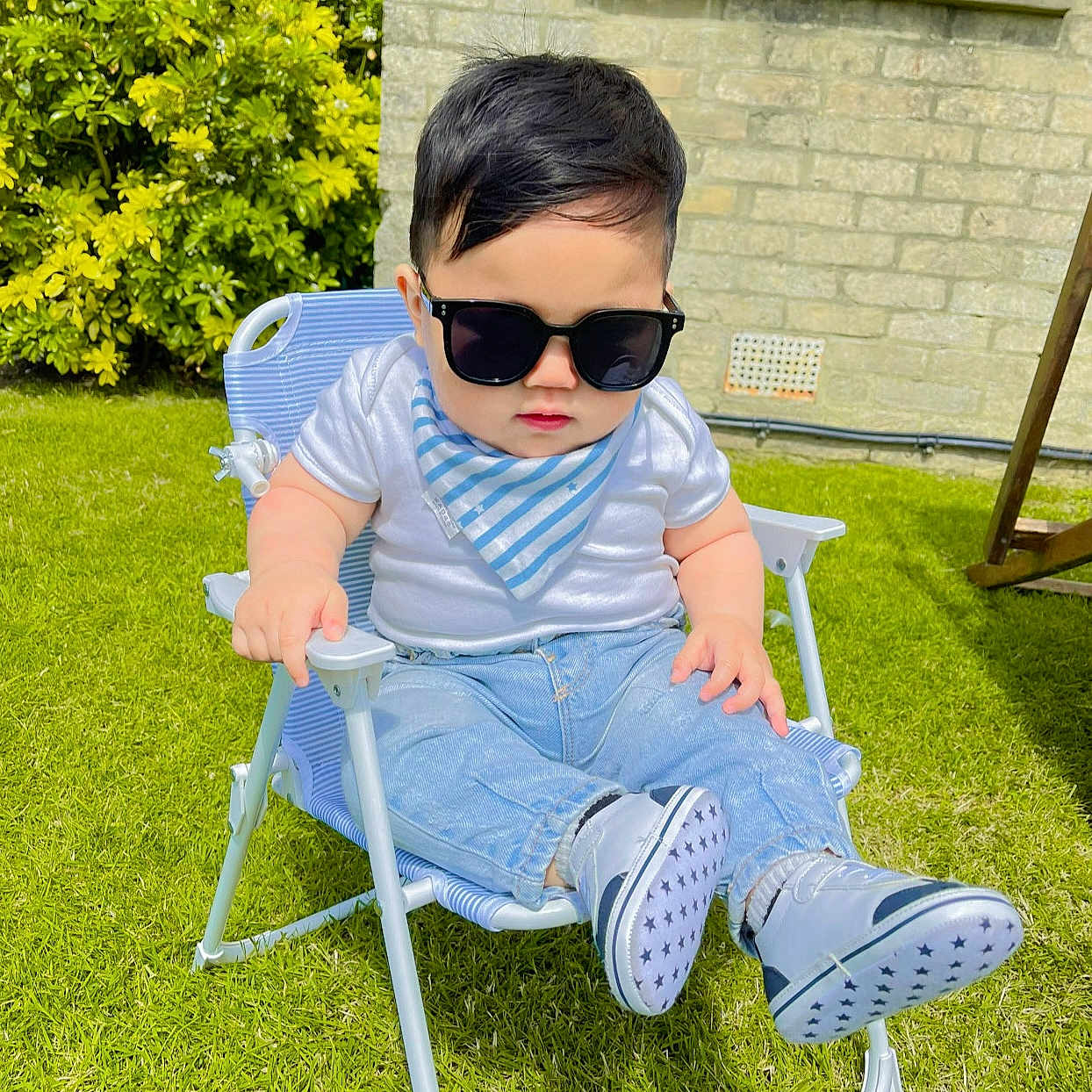 Edric joined the competition — help win amazing prizes! accessories, baby, backyard, clothing, face, footwear, grass, head, lawn, nature, outdoors, pants, person, photography, plant, portrait, shoe, sitting, sunglasses, yard