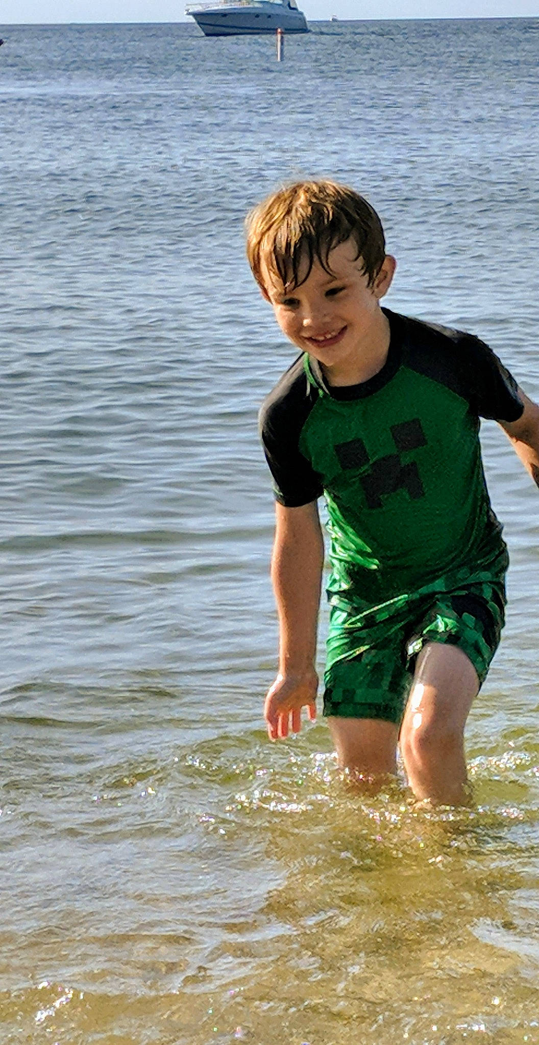 Landon joined the competition — help win amazing prizes! child, fun, happy, joy, male, person, play, sea, smile, summer, t_shirt, vacation, water
