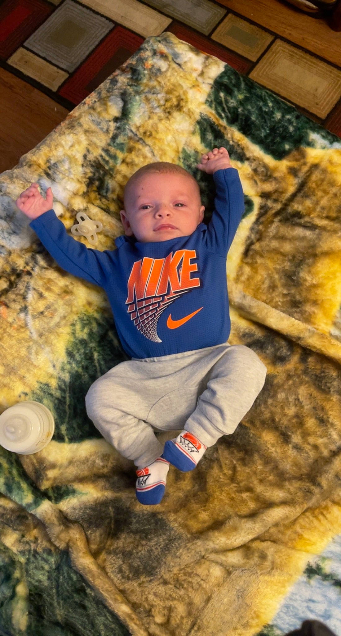 Bailey is registered to the contest to win money with this photo: baby, baby_toddler_clothing, chair, child, eye, flooring, fun, grass, happy, head, leisure, people_in_nature, person, play, sitting, soil, standing, t_shirt, toddler, wood