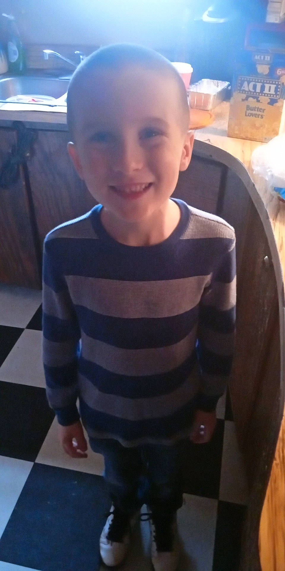 Christopher is registered to the contest to win money with this photo: baby_toddler_clothing, child, chin, cool, face, facial_expression, fun, hair, hairstyle, happy, head, joy, person, photograph, skin, sleeve, smile, snapshot, standing, t_shirt