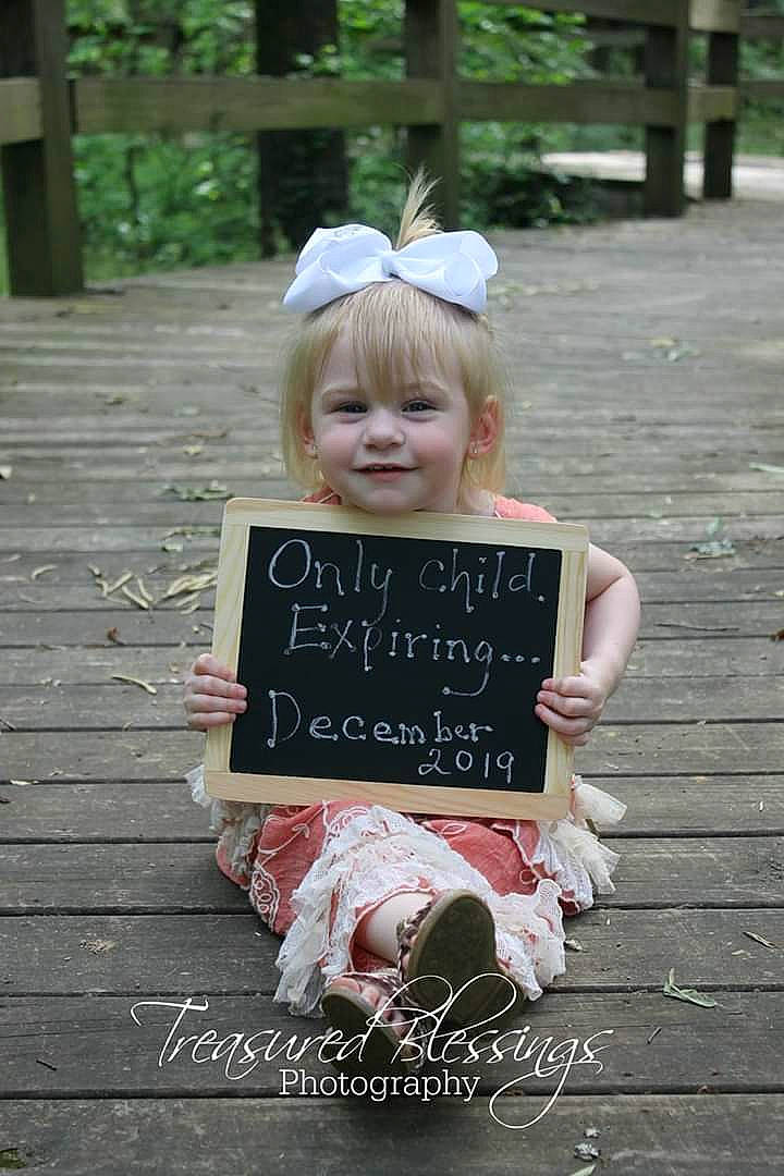 Annalynn is registered to the contest to win money with this photo: child, costume, flower_girl, hair_accessory, happy, headgear, person, photo_caption, pink, smile, textile, toddler