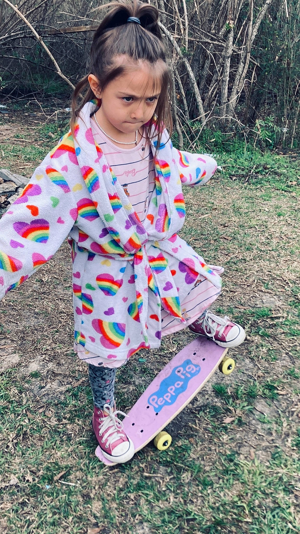 Marleigh Jean is registered to the contest to win money with this photo: child, face, fun, grass, head, pattern, people_in_nature, person, plant, recreation, shoe, sitting, skateboard, skateboard_truck, skateboarder, skateboarding_equipment, sleeve, sneakers, sports_equipment, toddler