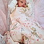 newborn, baby, infant, blanket, pink, clothing, pattern, deer, floral, cute, sleeping_bag, portrait, soft, cozy, indoors, child, face, hand, lying, cute_outfit