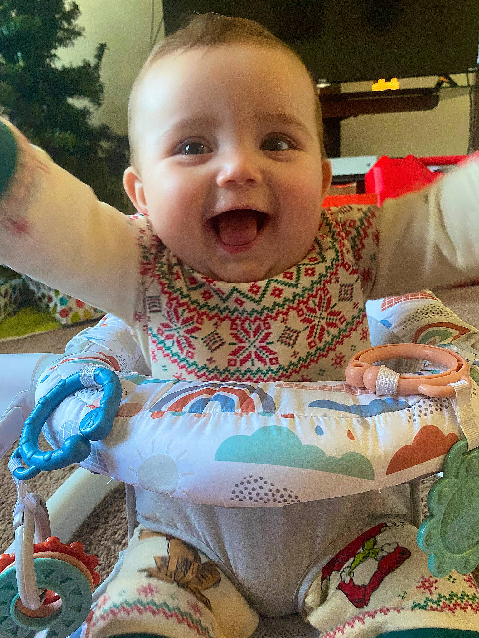 Adaleigh is registered to the contest to win money with this photo: baby, baby_products, baby_toddler_clothing, cheek, child, event, facial_expression, fun, happy, leisure, organ, pattern, people, person, sitting, skin, smile, t_shirt, toddler, tree