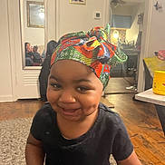 Miair joined the competition — help win amazing prizes! toddler, child, smile, headwrap, indoor, living_room, mirror, reflection, carpet, wooden_floor, table, container, people, family, happy, person, furniture, home, casual, portrait