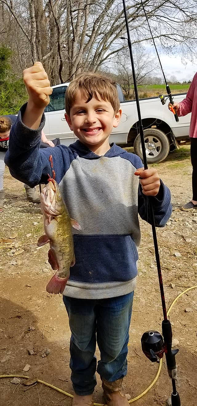 Siris joined the competition — help win amazing prizes! automotive_tire, car, fish, fisherman, fishing, grass, joy, landscape, person, plant, ray_finned_fish, recreation, recreational_fishing, shorts, smile, soil, tire, toddler, tree, vehicle