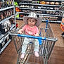Selena joined the competition — help win amazing prizes! toddler, child, shopping_cart, hat, cowboy_hat, store, aisle, halloween_decor, pumpkins, toys, clothing, floor, socks, person, cute, baby, retail, shopping, portrait, indoor