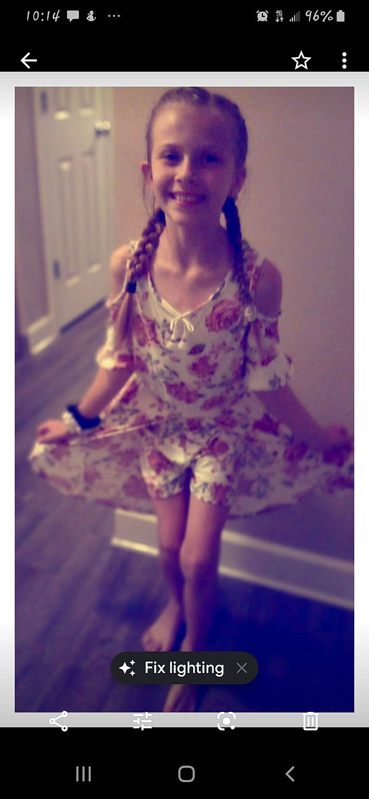 Kelden is registered to the contest to win money with this photo: child, dress, fun, joy, long_hair, person, photo_caption, pink, purple, smile, snapshot, toddler