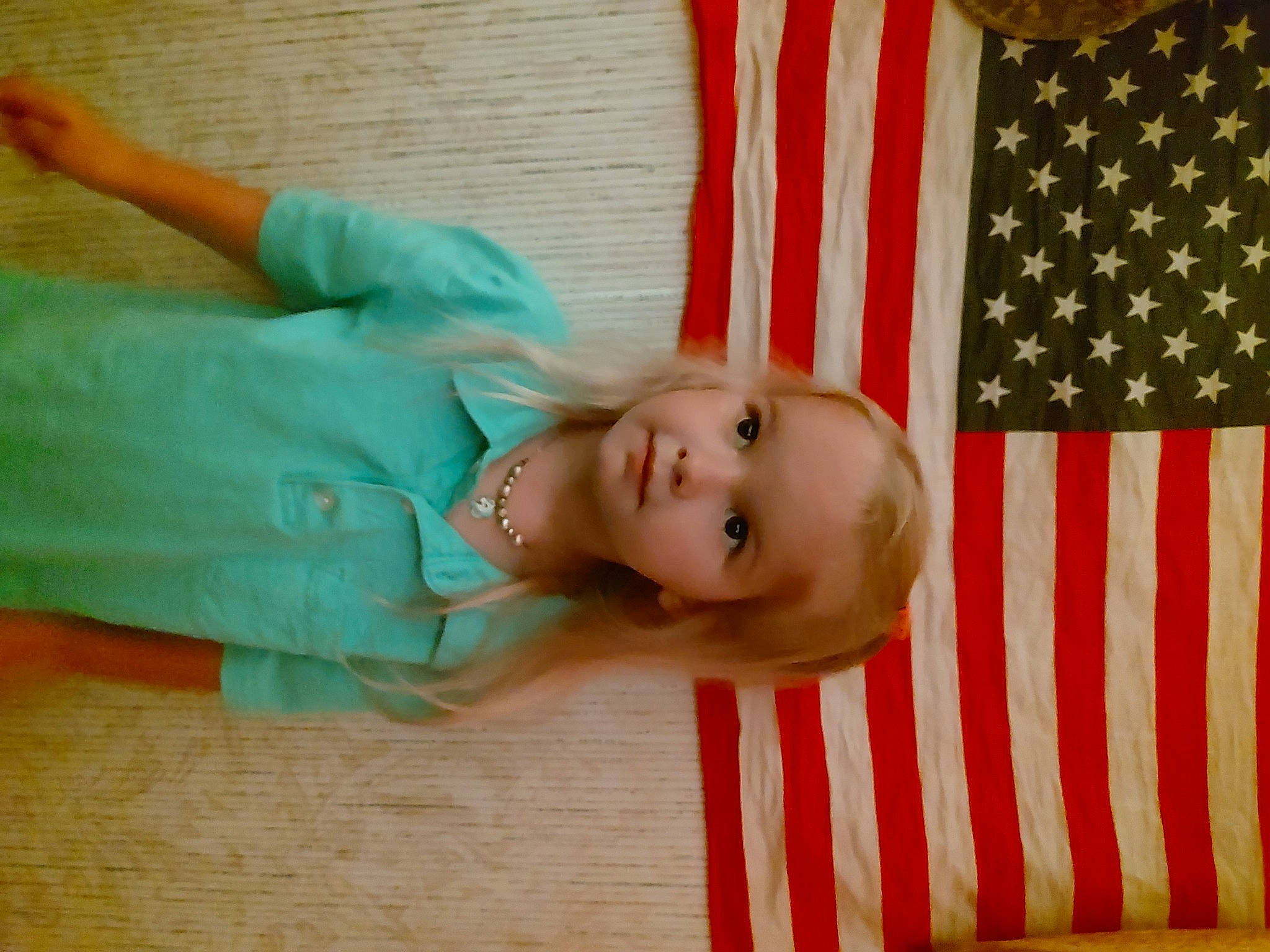 Zoey is registered to the contest to win money with this photo: baby, baby_products, baby_toddler_clothing, child, comfort, dress, event, eye, flag, flag_day_usa, flag_of_the_united_states, flooring, hardwood, holiday, linens, pattern, person, room, toddler, tree