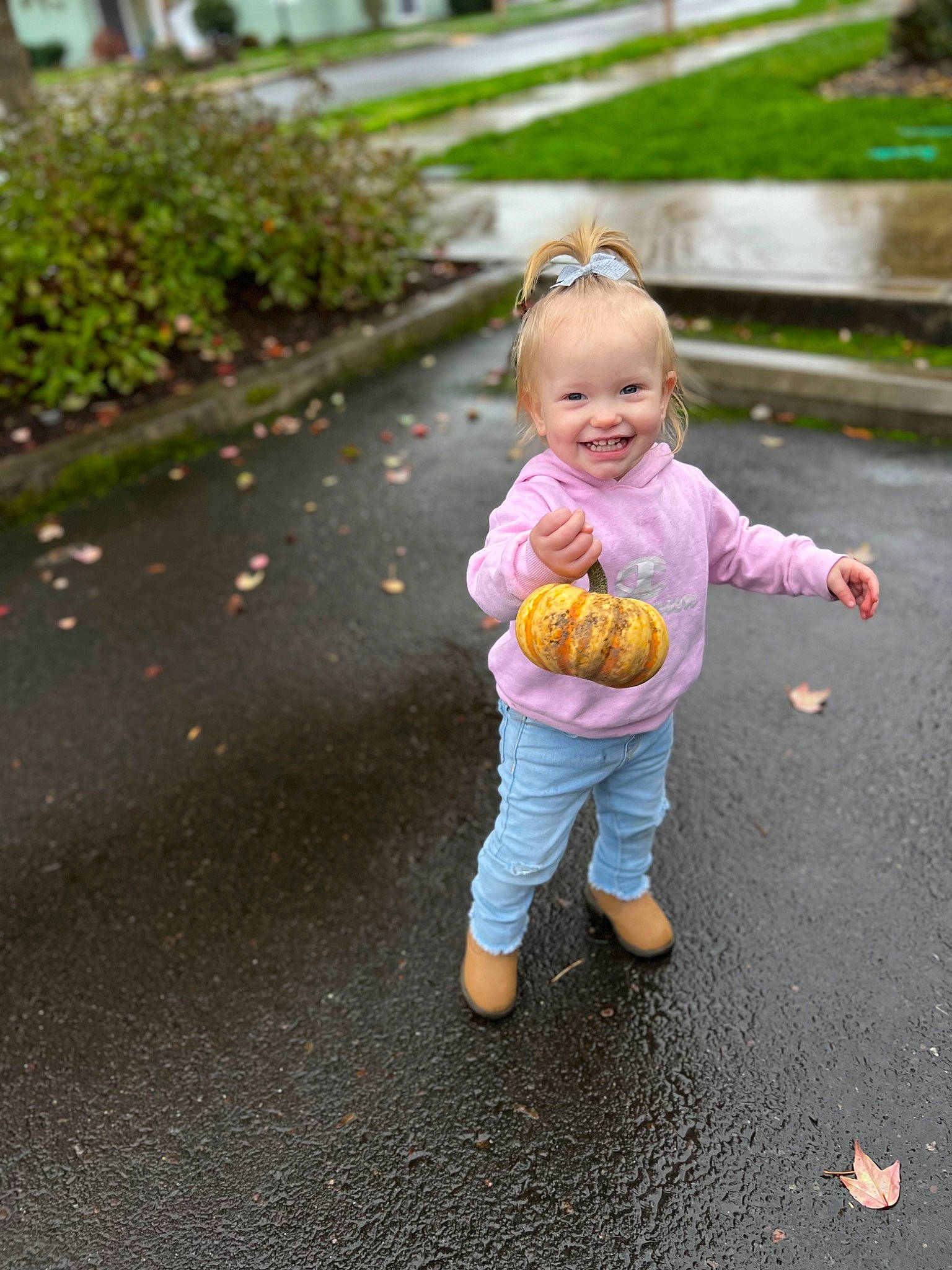 Avalynn joined the competition — help win amazing prizes! arm, asphalt, baby, baby_toddler_clothing, child, fun, gesture, grass, hand, happy, jeans, joy, leisure, people_in_nature, person, plant, recreation, road, road_surface, sitting