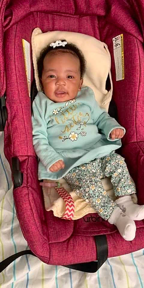 Melani is registered to the contest to win money with this photo: baby, baby_in_car_seat, baby_products, car_seat, cheek, child, person, pink, product, toddler