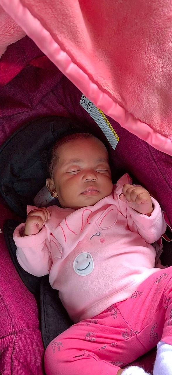 Melani is registered to the contest to win money with this photo: baby, bedtime, birth, cheek, child, comfort, mouth, nap, nose, person, pink, product, skin, sleep, smile, toddler