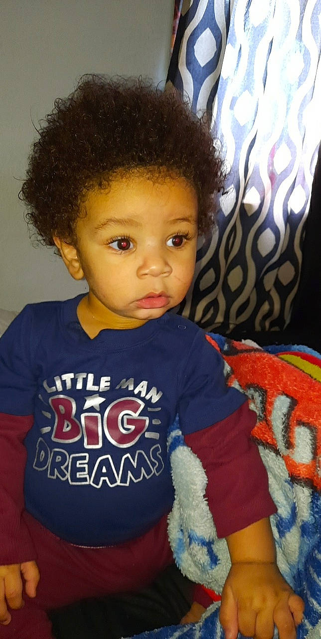 Jonova is registered to the contest to win money with this photo: active_shirt, baby_toddler_clothing, black_hair, cheek, child, cool, eyebrow, eyelash, forehead, hairstyle, iris, jheri_curl, neck, nose, organ, person, shoulder, skin, sleeve, textile
