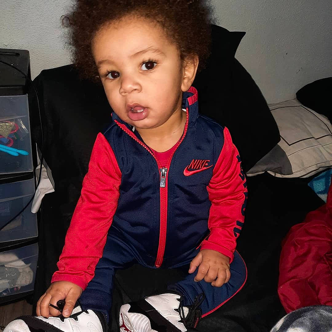 Jonova joined the competition — help win amazing prizes! child_model, cool, display_device, ear, eye, eyelash, gadget, hairstyle, hearing, jacket, jheri_curl, lap, multimedia, outdoor_shoe, output_device, person, shoe, sitting, sock, television_set