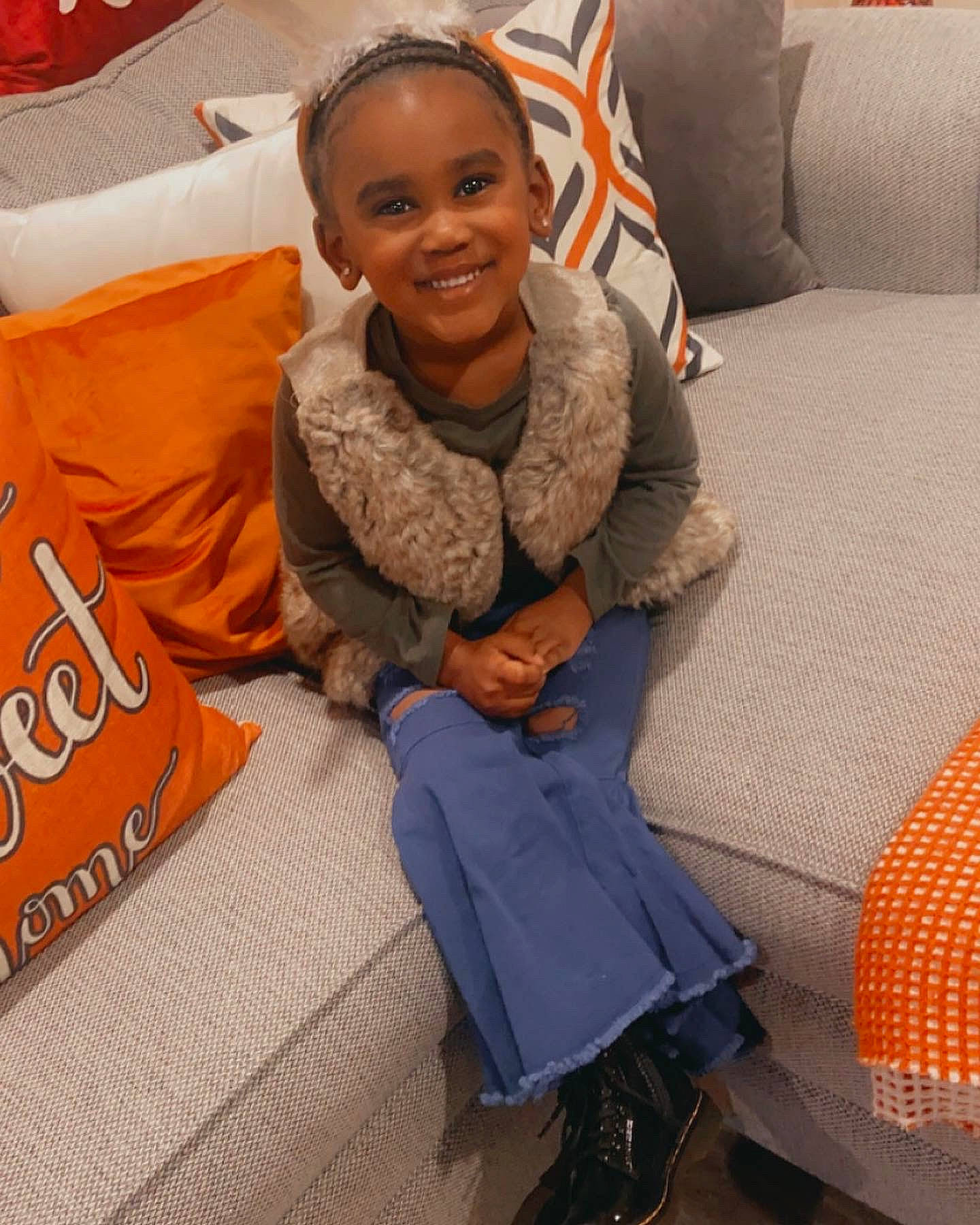 Azuri joined the competition — help win amazing prizes! boot, car_seat, child, comfort, face, flooring, fun, happy, head, human_leg, joy, knee, leisure, person, room, sandal, sitting, sleeve, smile, thigh