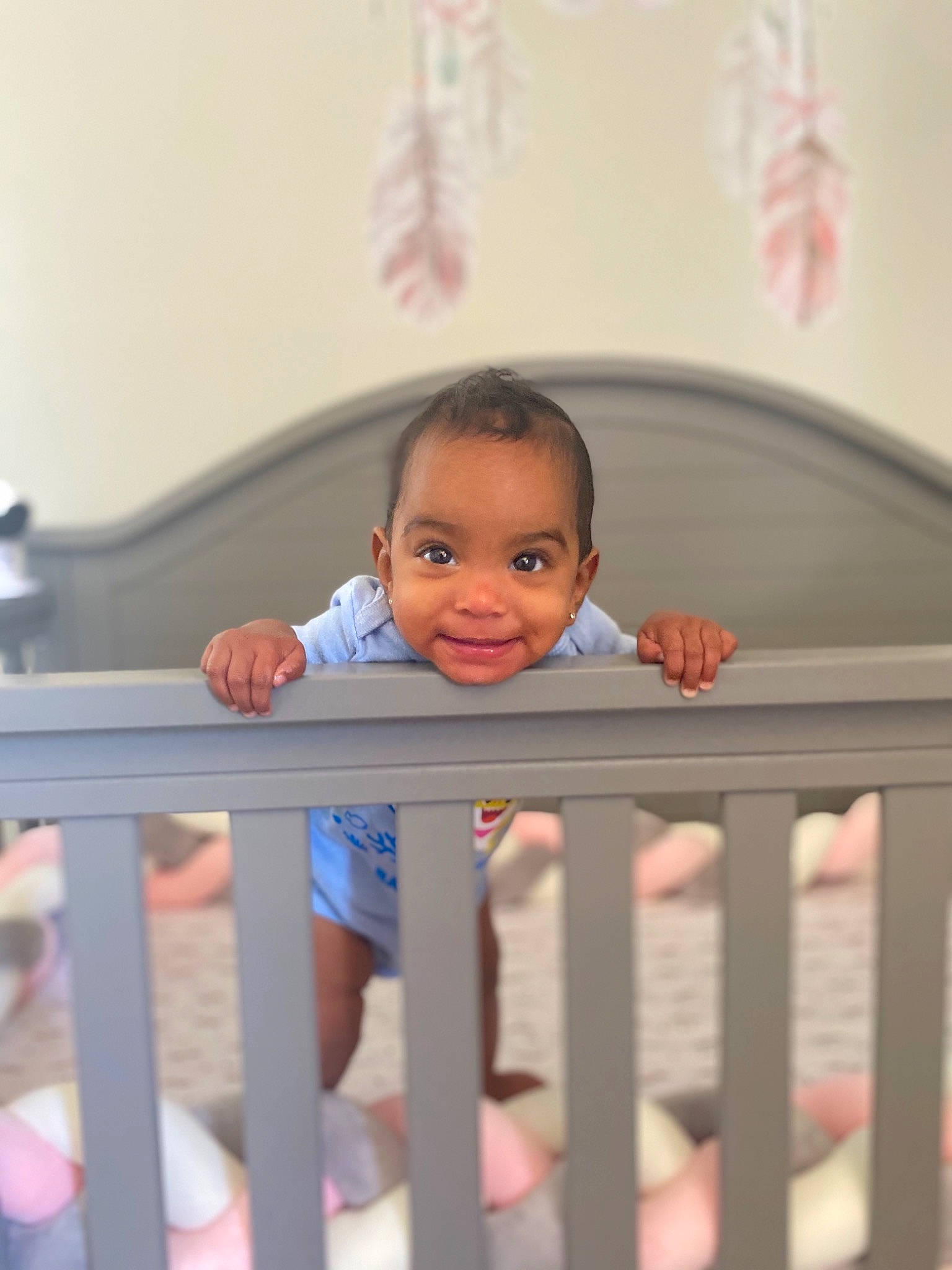 Aila joined the competition — help win amazing prizes! baby, baby_safety, baby_toddler_clothing, cheek, chin, cradle, eye, facial_expression, fence, hair, happy, human_body, infant_bed, iris, joy, nursery, person, product, skin, sleeve