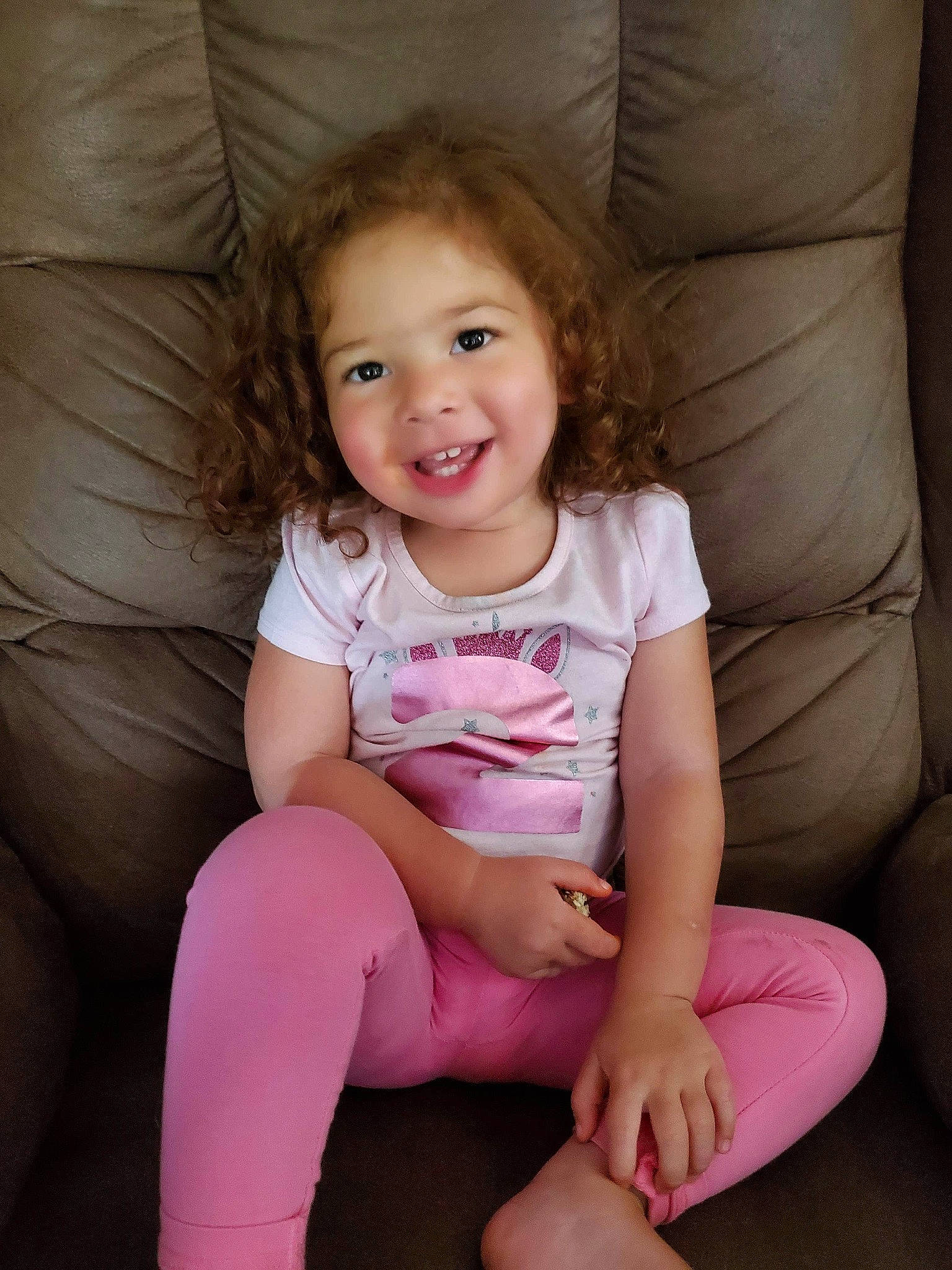 Isley is registered to the contest to win money with this photo: arm, cheek, chin, comfort, eye, hair, hairstyle, head, human_body, joint, joy, leg, lip, mouth, muscle, neck, person, shoulder, skin, smile