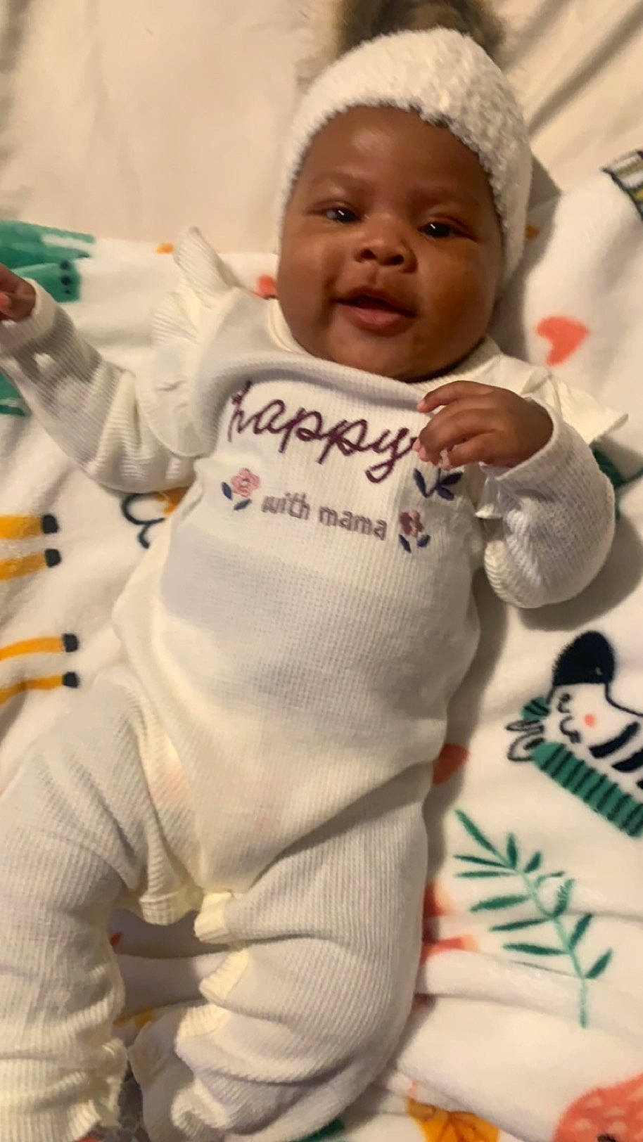 Azaria joined the competition — help win amazing prizes! arm, baby, baby_toddler_clothing, cheek, child, face, facial_expression, gesture, hairstyle, hand, happy, head, linens, person, skin, sleeve, smile, t_shirt, thumb, toddler