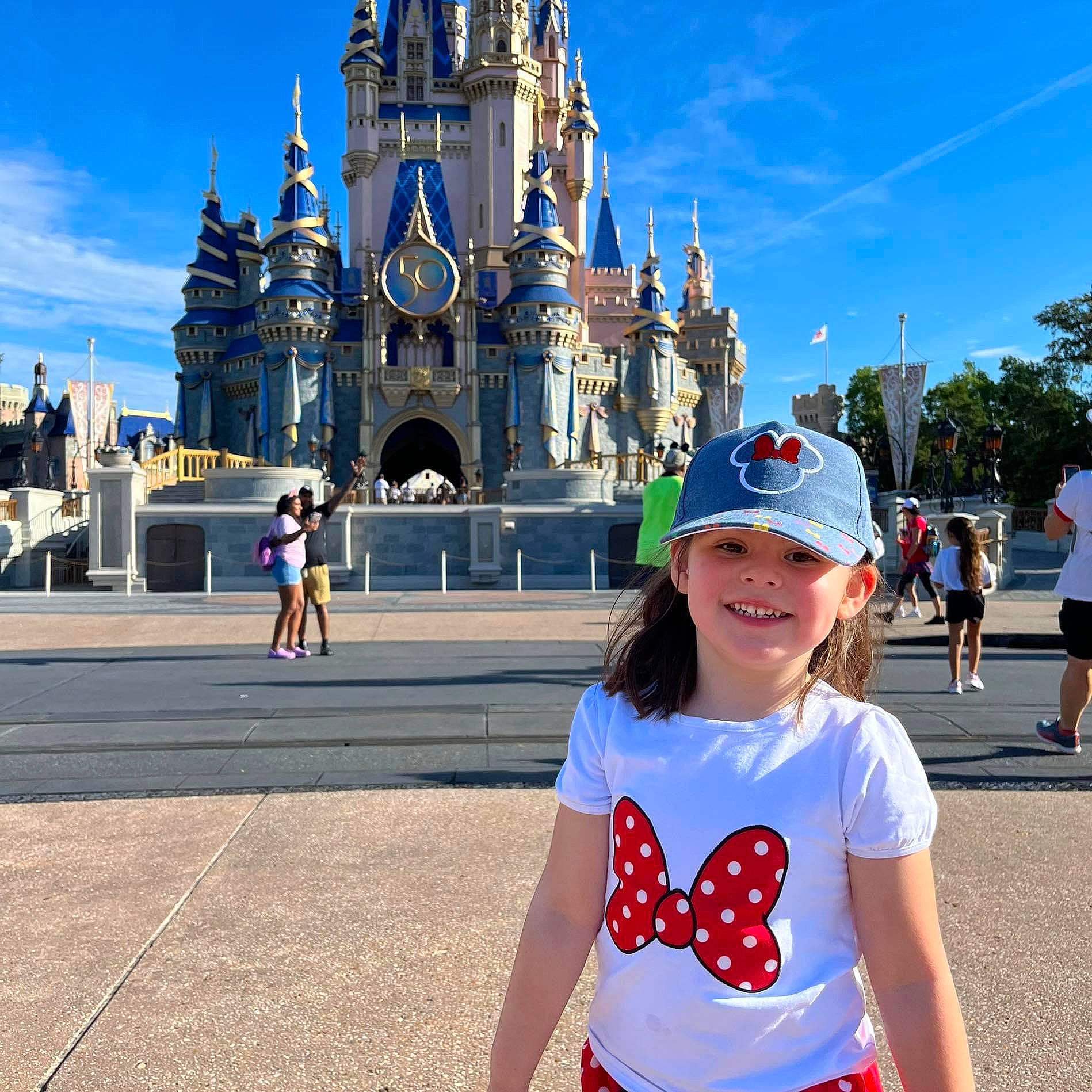 Norah joined the competition — help win amazing prizes! baseball_cap, cap, city, daytime, eyewear, fun, happy, headwear, joy, leisure, outdoor_recreation, pedestrian, person, recreation, sky, sleeve, smile, summer, sunglasses, t_shirt