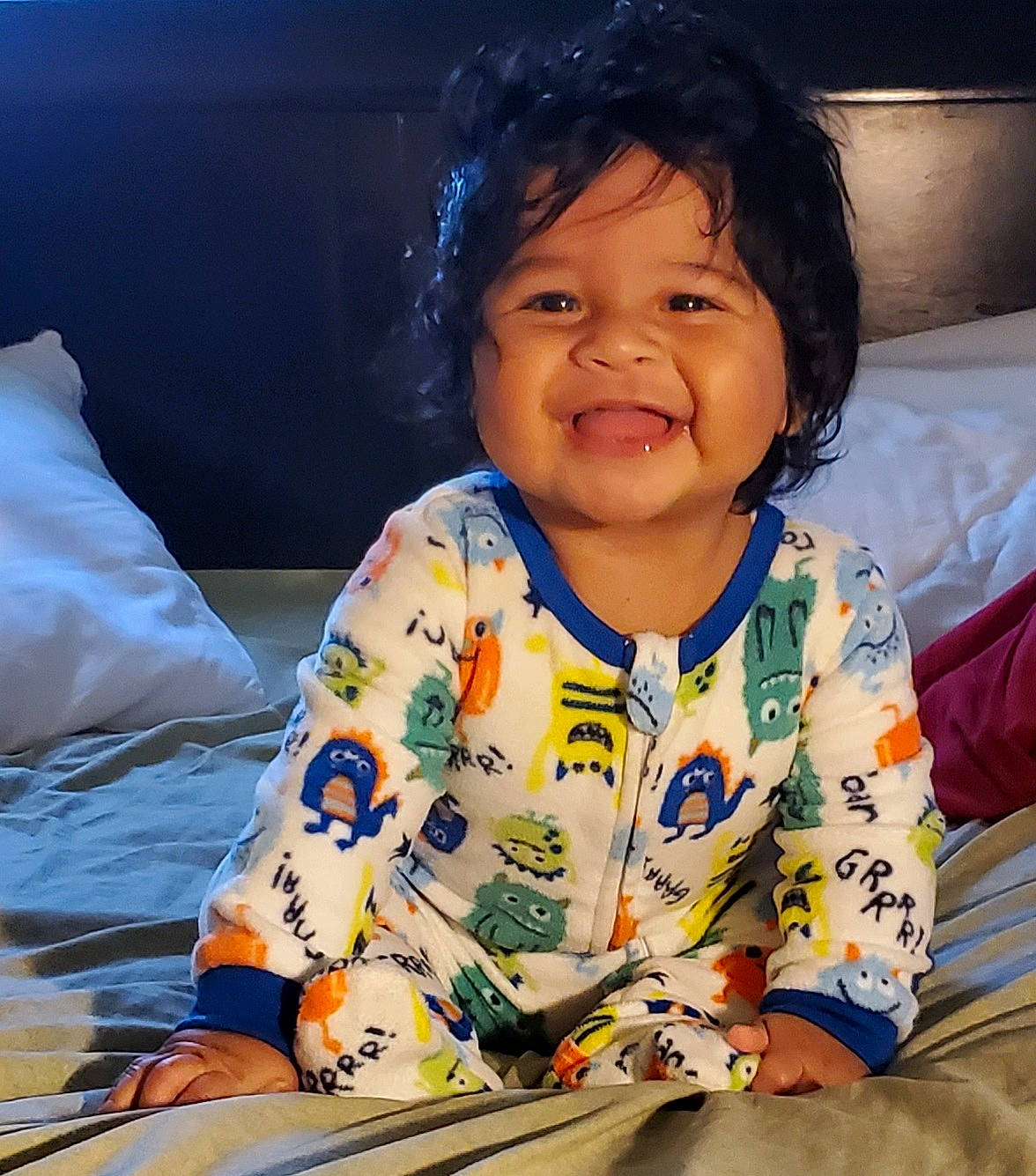 Dylan is registered to the contest to win money with this photo: adaptation, black_hair, cheek, child, face, happy, joy, nose, person, play, sitting, smile, toddler