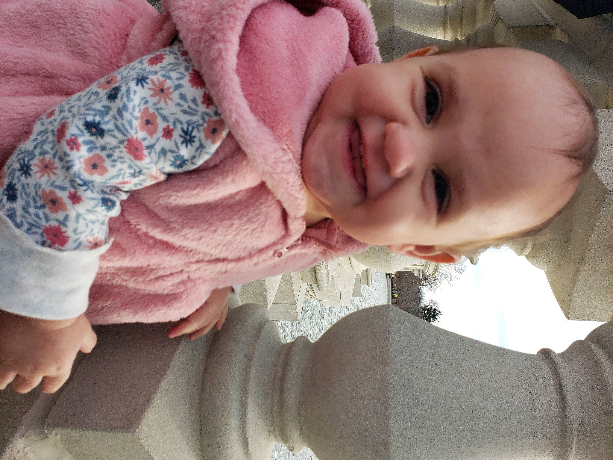 Leyla is registered to the contest to win money with this photo: baby, baby_toddler_clothing, cheek, comfort, eye, facial_expression, finger, gesture, hand, happy, iris, joy, lip, mouth, neck, nose, person, pink, skin, sleeve