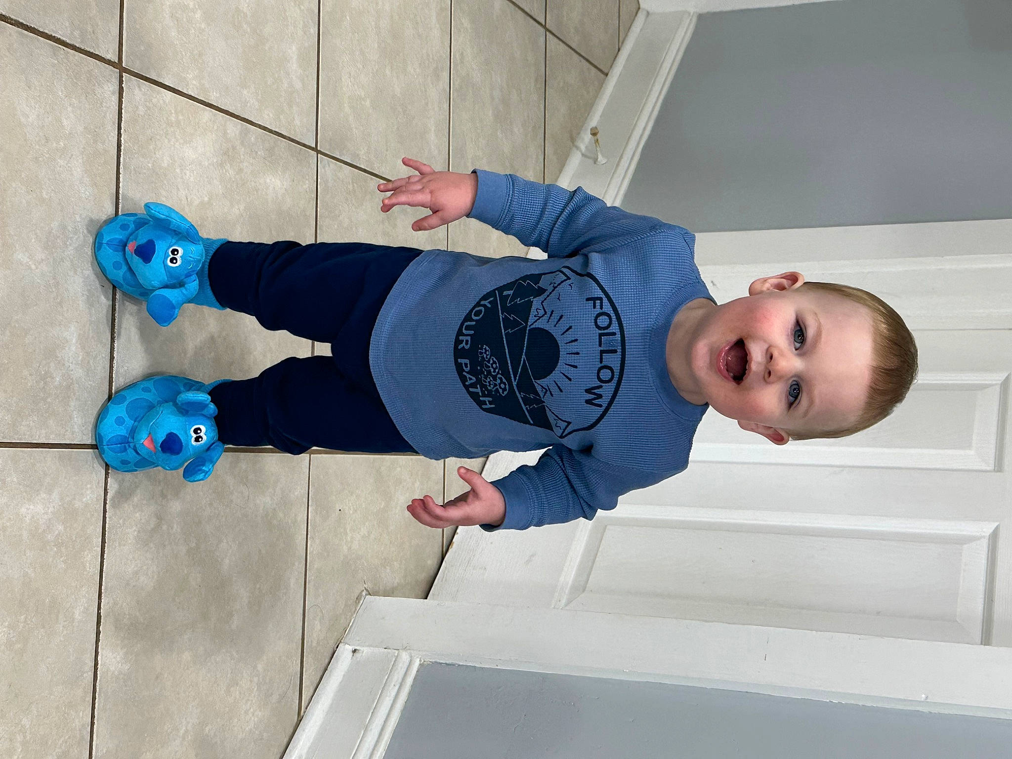 Beckham is registered to the contest to win money with this photo: baby_toddler_clothing, child, cleanliness, electric_blue, flooring, fun, happy, person, recreation, smile, sneakers, t_shirt, toddler, walking_shoe