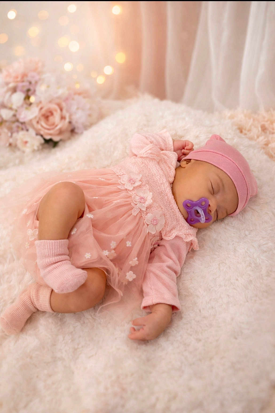 Amina a rejoint le concours — aidez-le/la à gagner de superbes lots ! baby, sleeping, pink_dress, pacifier, hat, blanket, flowers, soft_lighting, cozy, infant, cute, portrait, toddler, newborn, sleep, soft_texture, indoor, decor, child, peaceful