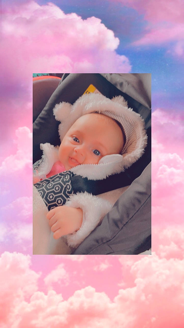 Aline participe au concours pour gagner de l'argent avec cette photo : art, baby, baby_products, baby_sleeping, baby_toddler_clothing, child, cloud, flash_photography, gesture, happy, pattern, people_in_nature, person, photomontage, picture_frame, pink, skin, sky, stock_photography, toddler