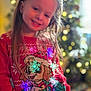 accessories, bodypart, child, clothing, costume, face, female, girl, happy, head, knitwear, lighting, pants, pattern, person, photography, portrait, smile, sweater, t_shirt