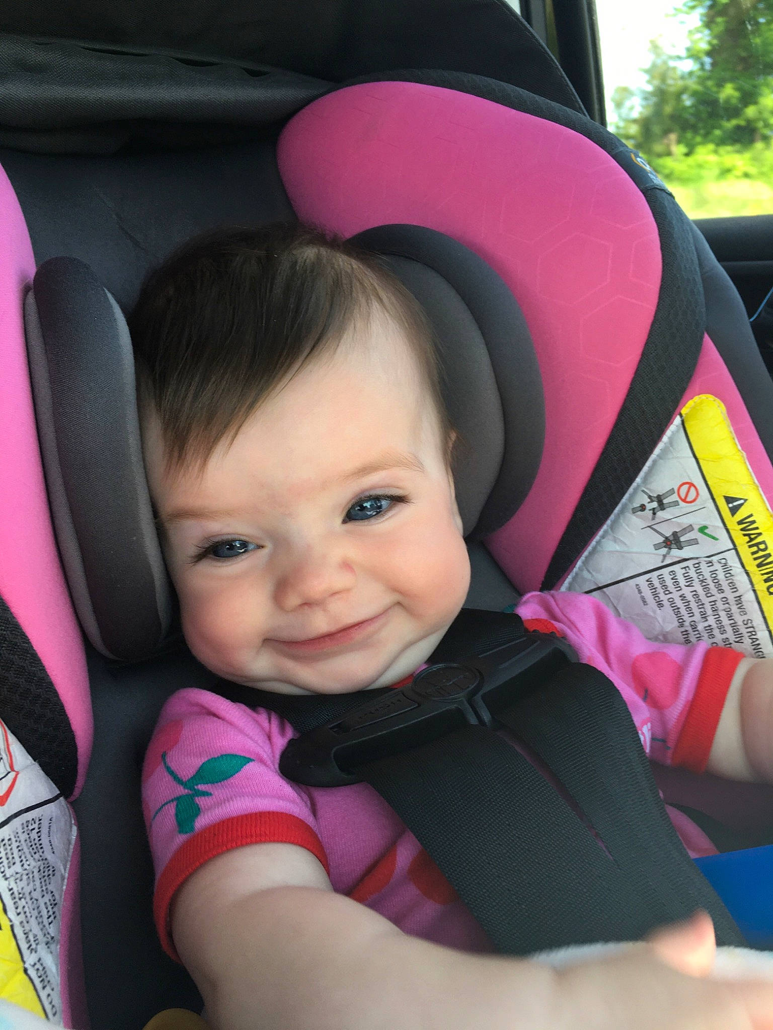 Rumer joined the competition — help win amazing prizes! automotive_design, automotive_exterior, car_seat, car_seat_cover, comfort, cool, finger, fun, happy, hat, joy, mammal, motor_vehicle, person, pink, product, seat_belt, skin, smile, toddler