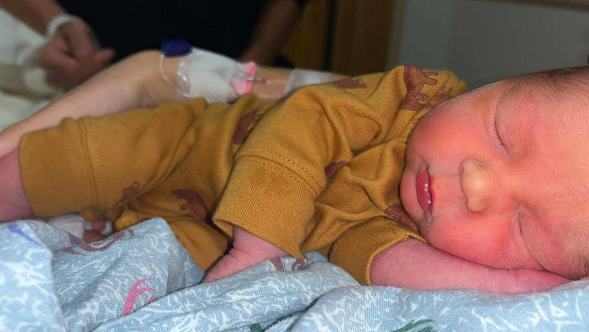 Braxton joined the competition — help win amazing prizes! baby, baby_toddler_clothing, bedtime, bottle, cheek, child, comfort, ear, finger, hand, linens, mouth, nail, nose, person, plastic_bottle, room, skin, thumb, toddler