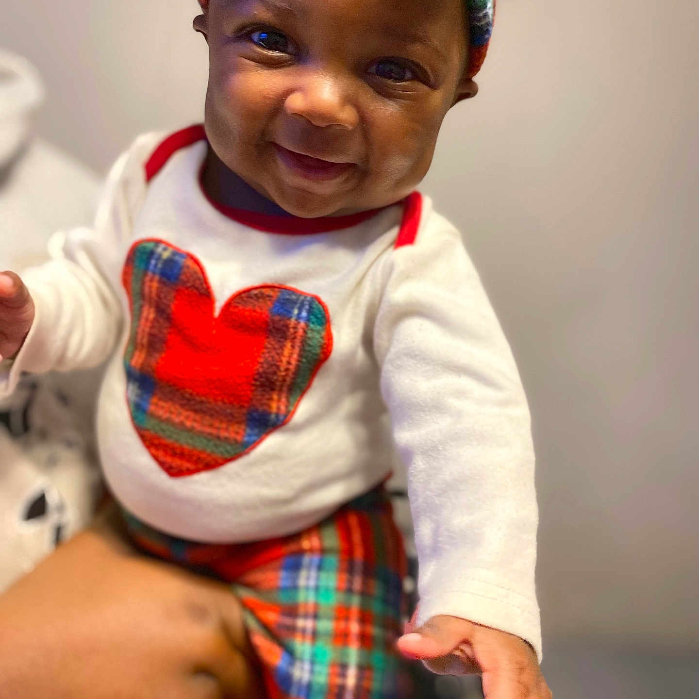 Kaianna joined the competition — help win amazing prizes! accessories, baby, babylaughing, bodypart, clothing, dress, face, finger, hand, happy, head, jewelry, laughing, necklace, person, photography, portrait, shorts, sitting, smile